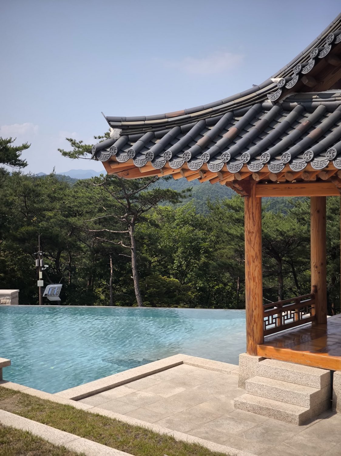 An infinity pool meeting the eave line
