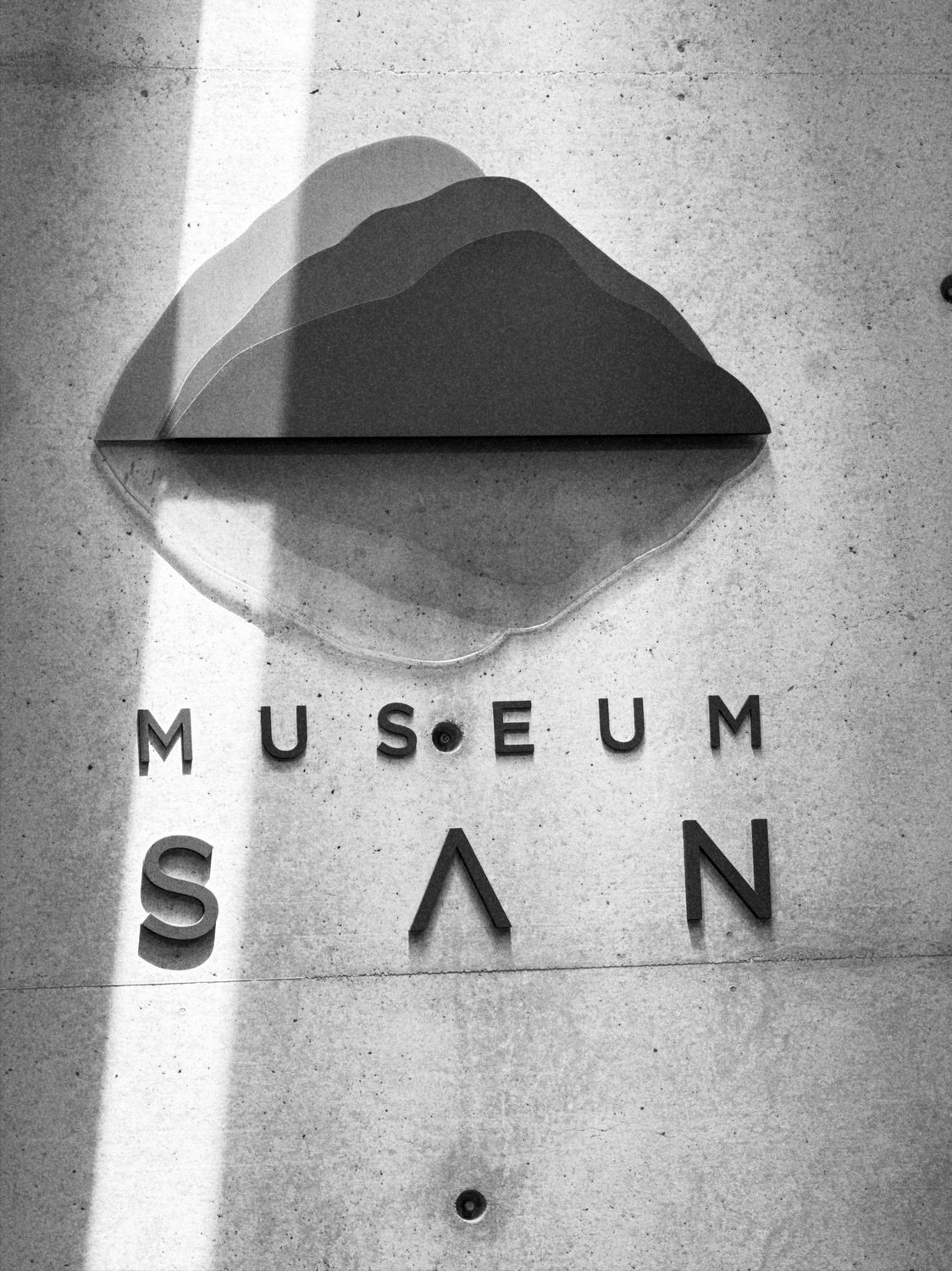 Museum SAN signage in passing light